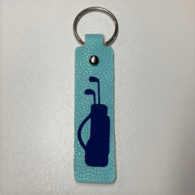 Faux Leather sports themed key fobs, golf bag blue