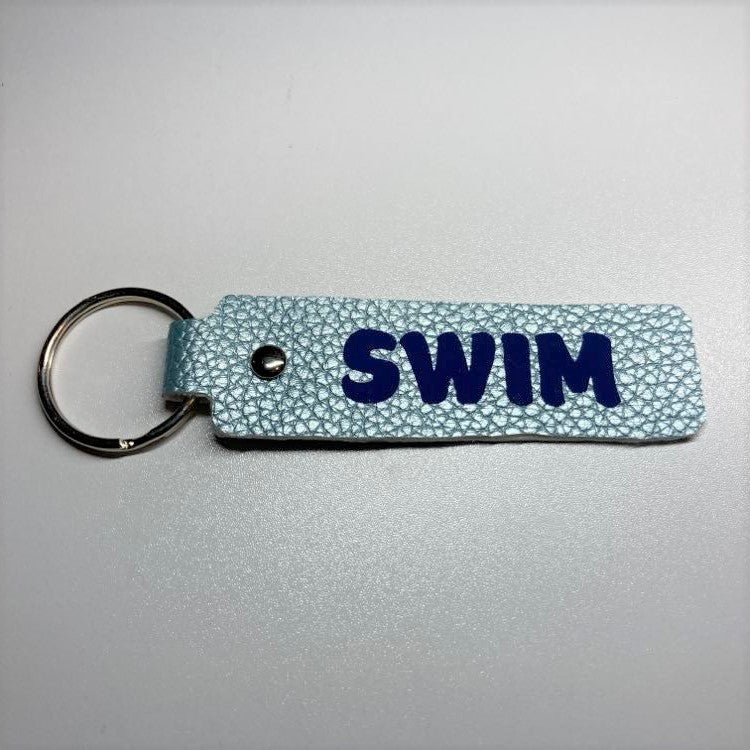 Faux Leather sports themed key fobs, swim blue