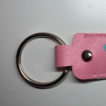 Personalized key fob/bag tag close up of rivet and ring